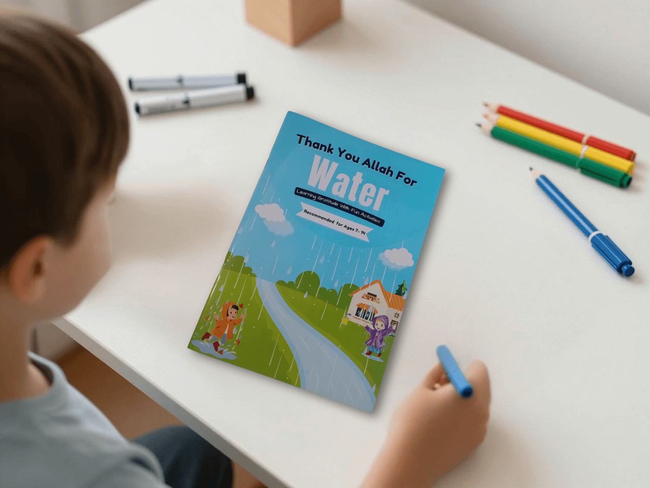 Child reading book Thank You Allah for water
